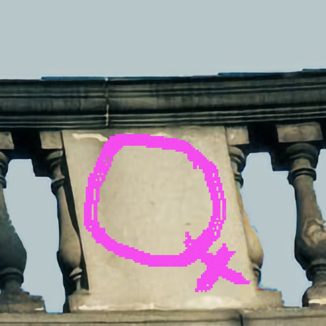 Photo of a ♀ pictogram digitally painted against stone wall at an angle