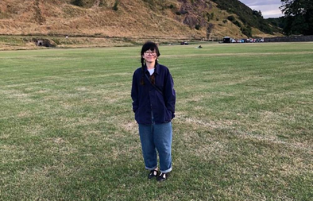 Picture of Aerin Lai in front of a mountain