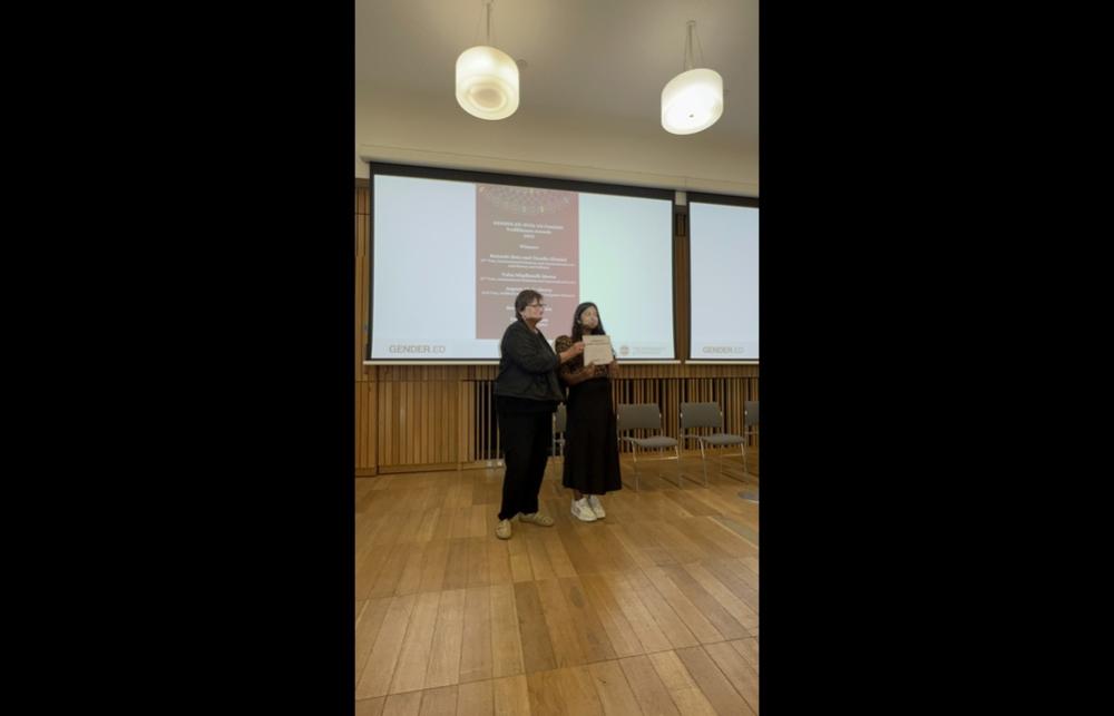 Thulsa Receiving Feminist Undergraduate Trailblazer Award Second Prize at the Annual GENDER.ED Showcase 2025. She Received the from Fiona Mackay.